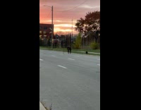 Man orange beanie street workout video shoot