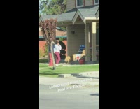 Two girls dance tiktok house front