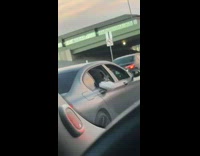 Woman car window sunset underpass loud guy