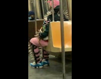 Person on subway is covered in spikes 