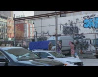 People dressed as andy warhol filming a dance crew video