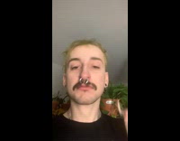 Man cries and uses rat to wipe tears