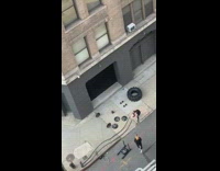 Girl records herself exercising on side walk