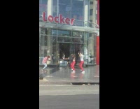 Couple red pants dance outside establishment hollywood