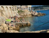 Collab IITW - Woman in bikini dance at the rock by the beach shore