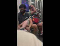 Two guys wear the same banana shirt subway