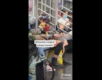 Woman sleeping on subway train with dog laying against her