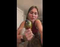 Girl talks about her smart green bird