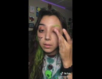 Girl alien hits face makeup palette 