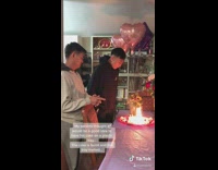 Birthday cake on fire mom sings