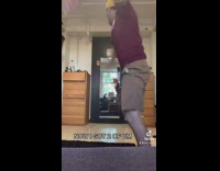 Guy with vaccination card has two v cards