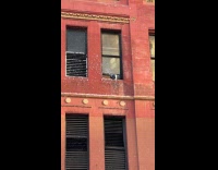 Machine on window sprays foam looked snow