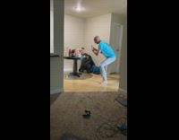 Bald guy blue shirt takes photo food