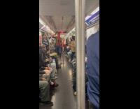 Spiderman dances in middle of the train