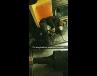 Guy counting wads of money on subway