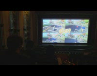 People play Mario Kart on Theater screen