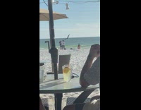 Bikini girl all fours shakes butt beach 