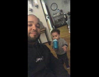 Dad drinks and reacts with ah baby also drinks and reacts