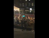 Guys play instruments restaurant patio white canopy 