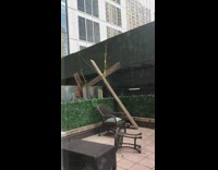 Cables tied to wood cross lift up