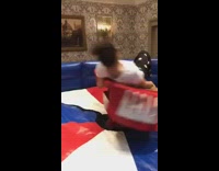 Girl rides mechanical magic carpet ride and gets thrown onto floor
