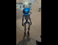 Robot giving man complements 