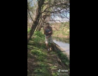 Guy loses footing falls into lake nature