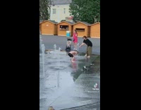 BitchMP - Little boy black shorts lets water stream spray his butt 