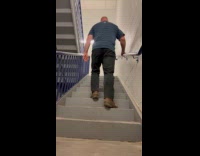 Man farting while climbing stairs