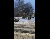 Dune buggy on sidewalk reversing out