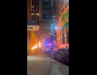 Pile of trash burn on street night part 1