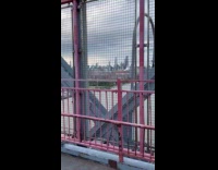 Crowd watching DJ performs at Williamsburg bridge