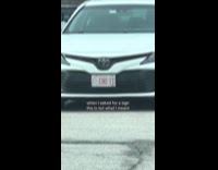 Woman sees license plate that says end it