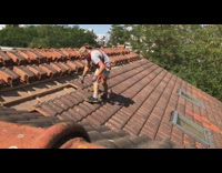 White shirt guy takes off roof panels 