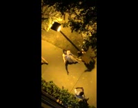 Two men photo shoot nighttime orange traffic barrier Part 3