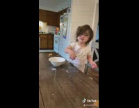Little girl throws milk bowl at dad 