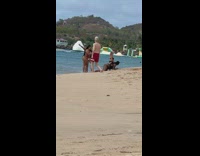 Collab IITW - Woman in black bikini bends and twerks at the beach