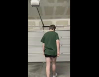 Green shirt guy dances alone garage 