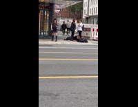 Emo girl poses in front of Mexican grill 