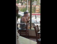 Man black tank top sings with coffee and nose accessory Part 2