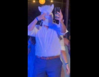 Man llama mask selfie dance at party