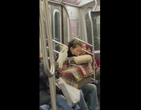 older woman white parrot subway