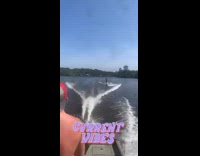 Guy catches beer can throw from boat