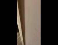 Girl sneaks up on sister dancing in room