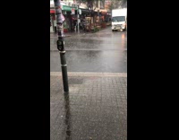 Wind cause ripple effect on street rain