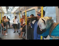 2 fishermen carry fishes on train 