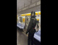 Guy rides hover board and train