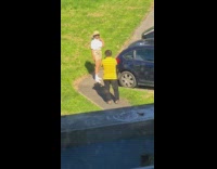 Girl brown bucket hat yellow shirt dad 