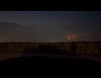 Thunderstorm lightning flashing lights on clouds night