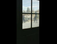 Girl throws rainbow jacket at photographer 